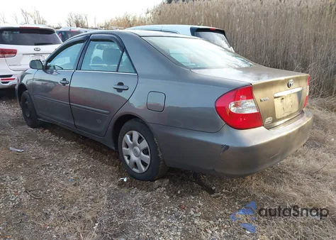 2003 Toyota Camry Le z USA, uszkodzony, nr VIN 4T1BE32KX3U663756